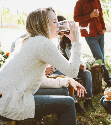 girl tasting wine