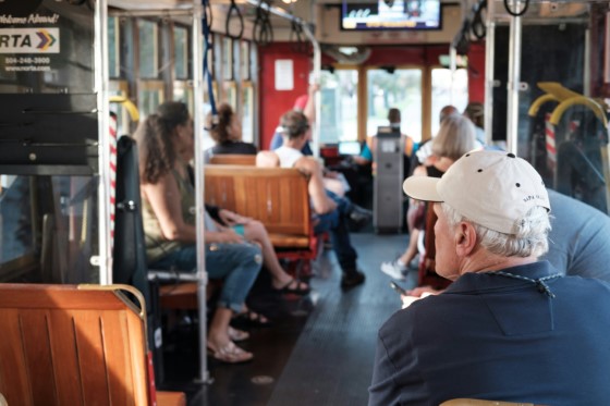 trolley bus full of people